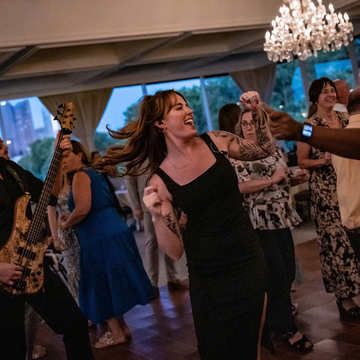 Columbus Ohio Wedding Band on the Dance Floor Playing Music and Singing